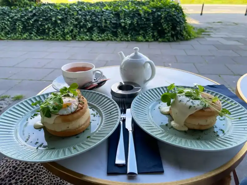 Eggs Benedict on the terrace ☀️ The best brunch in town!
